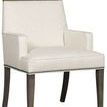 Three-quarter view showing plush seat cushion and gently curved armrests of the chair