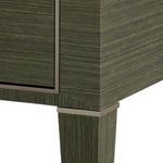 Detail of the champagne-gilded ribbon border outlining Morris Desk corner and leg joint