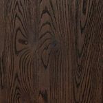 Close-up of dark oak wood texture with prominent grain pattern on Torrington Bookcase