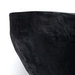 Close-up view showing fine wood grain texture and black carbonized finish