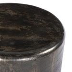 Close-up of the smooth rounded top surface in distressed bronze finish
