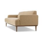 Ethel Sofa angled left highlighting the armrest, tapered legs, and wood frame detail