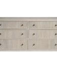 Carmen Dresser with six white oak drawers featuring vertical grooves and metal knobs in a light finish