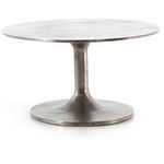 Three-quarter side view revealing table depth and elliptical shape of tabletop