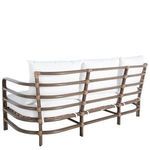 Side rear angle showing oak sofa frame structure with white cushions on top