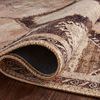 Rolled edge detail of Wynter rug revealing woven backing and thickness
