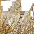 Close-up of gold wrought iron leaf ribs and exposed bulb sockets in Leaflace Semi-Flush Mount