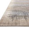 Low angle close-up showing the textured, plush pile and edge of the Wyatt Stone beige rug