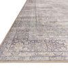 Close-up of Wynter rug edge showing intricate patterned border and flat woven texture