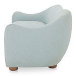 Side view of Bria sofa highlighting its rounded armrest and smooth textured fabric