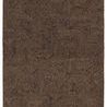 Quarion handmade geometric rug in tan and black with a textured loop pile and unique linear motifs