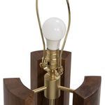 Close-up of brass lamp socket and switch mounted on the central brass rod with dark wood base segments