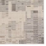 Close-up straight view highlighting detailed linear and block pattern in the rug's surface texture