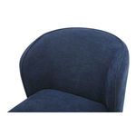 Close-up of top corner of curved backrest with visible stitching and fabric texture