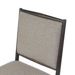 Side close-up showing corner join of fabric backrest and tapered wooden frame