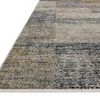 Close-up of the rug's thin profile and edge binding on a light wood floor