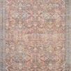 Adrian Rust / Denim Rug with vintage-inspired floral patterns in warm rust, blue, and beige tones