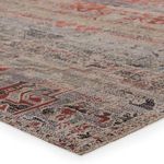Close-up corner view showing rug’s flat weave texture and detailed multicolor pattern