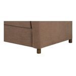 Close-up on sofa corner and wood leg with visible brown washed linen texture