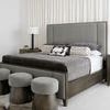 Side view of Linea dresser in room with soft light and decorative stool beside it