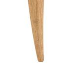 Close-up of the tapered oak leg showing fine wood grain texture