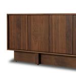 Angled side and front view emphasizing rectangular shape and plinth base design