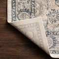 Folded corner of Teagan Natural Lt Grey Rug turned up revealing backing texture and weave pattern