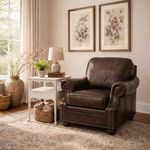 Montgomery Chair styled in a room setting beside side table, lamp, and floral wall art