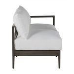 Side view focusing on thick cushioned seat and aluminum armrest