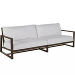 Avondale Aluminum Sofa angled side view showcasing brown aluminum frame and white seat cushions