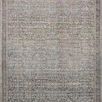 Traditional rectangular multi-color rug with intricate vintage-inspired pattern in warm hues of blue, pink, and beige