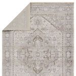 Top corner folded to reveal the robe underside with muted pattern in neutral shades