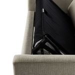 Overhead detail of sleeper frame corner with joint and fabric tension visible