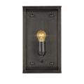 Detail of screw and rounded joining hardware on matte black frame of Royster Outdoor Wall Sconce