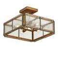 Square Semi-Flush Mount with textured glass panels and gold frame seen from a lower side angle