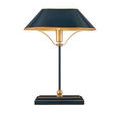 Front view of lamp showing gold-trimmed navy-blue shade with outward curved edges