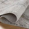 Close-up of Hollis Mist rug folded to reveal soft texture and weave details