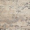 Top-down view highlighting the full abstract pattern and color blending of the Theory Taupe Grey Rug