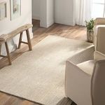 Natural-fiber rug showcased in bright living space with wooden flooring and light curtains