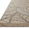Close-up angled view showing fringe detail and textured woven leaf pattern