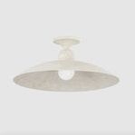 Side angle of lit flush mount ceiling light emphasizing soft limewash texture and subtle curvature