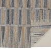 Beckett rug flipped corner showing woven backing and fringe detail