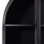 Close-up of cabinet's top corner interior framing and hinge details