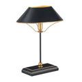 Slim black stem supporting trapezoidal black shade with gold inner lining and curved gold supports