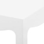 Tight angle highlighting smooth lacquer finish and curved apron corner of Jacqui Tea Table