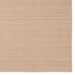 Zoomed-in view of edge showing detailed woven finish and fine striped pattern