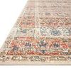 Close-up angled view showing the soft pile texture and detailed border of the Saban Sand Rust Rug