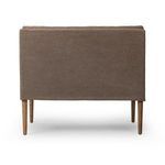 Back view of Aurelia Dining Banquette showing smooth upholstery and wooden taper legs