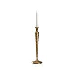 Tall Charlotte Candlestick with ribbed brass tapered silhouette holding a white taper candle