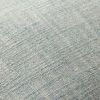 Close-up of the woven pale blue cotton blend fabric showing fine texture and heathered color